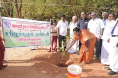 mrs-k-jayameenadevi-m-sc_-m-ed_-deo-madurai-planting-the-sapling-on-the-eve-of-65th-republic-day-celebration